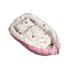 Babynest mit Kissen in Rosa