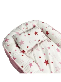 Babynest mit Kissen in Rosa