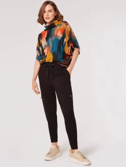 Bluse in Orange/ Petrol