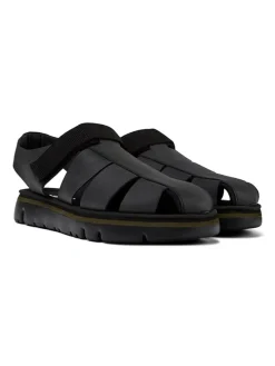 Halbsandalen "Oruga" in Schwarz