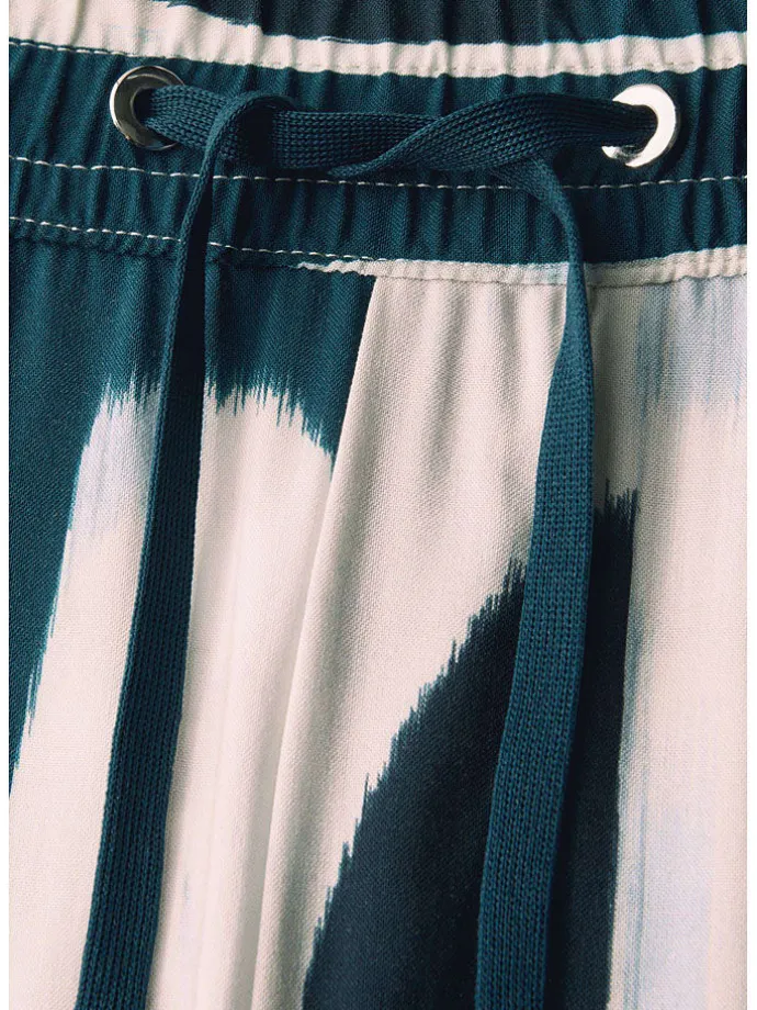 Hose in Petrol/ Creme
