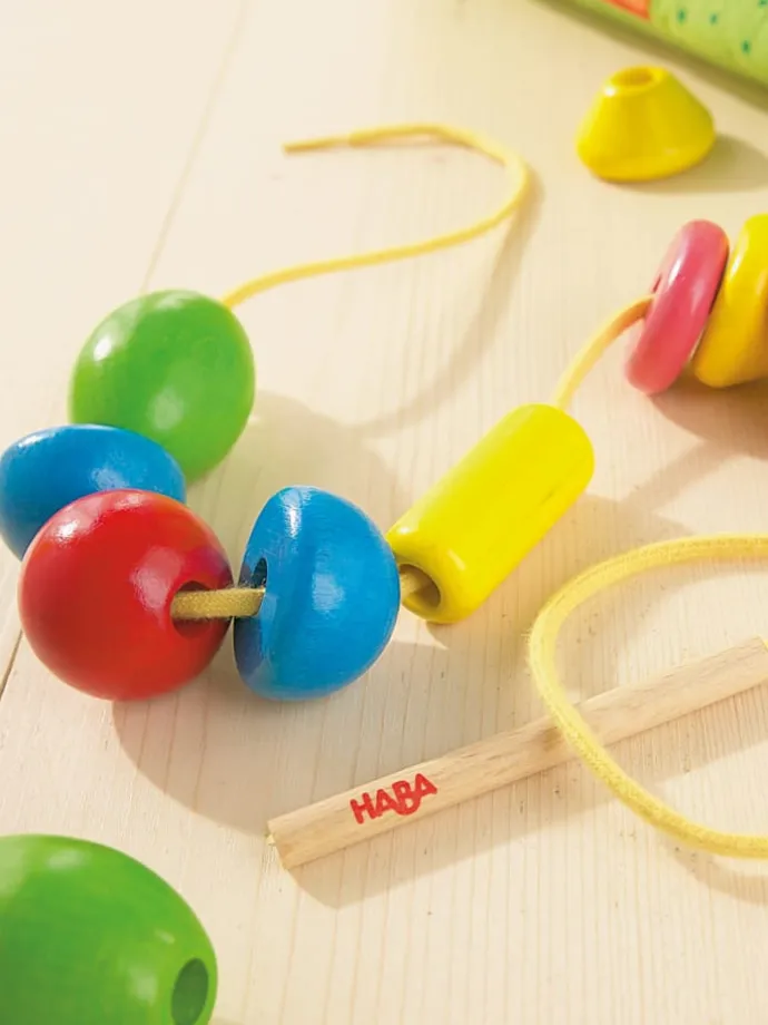 Lernspielzeug Fädelspiele in Bambini Perlen